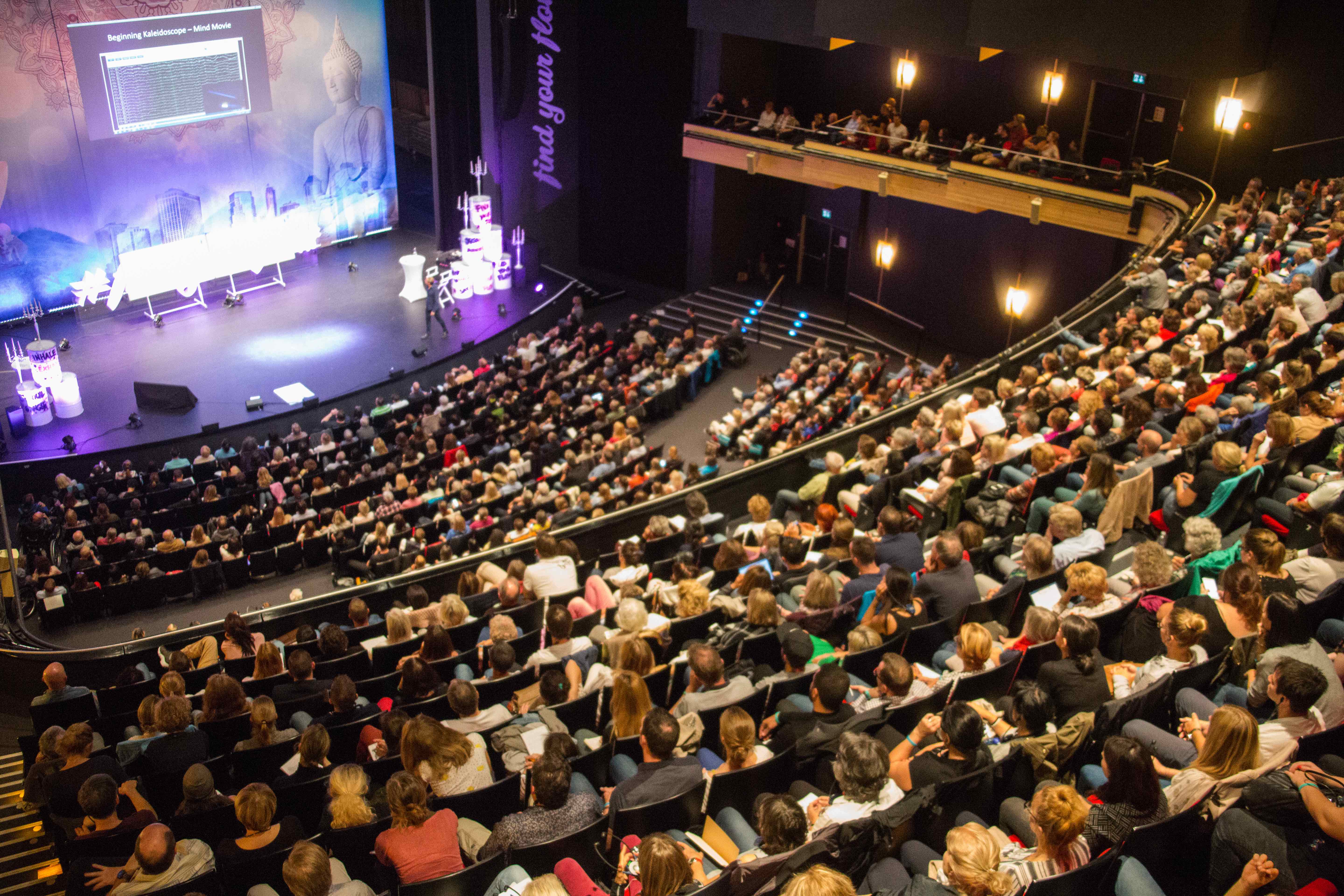 A large gathering in an auditorium